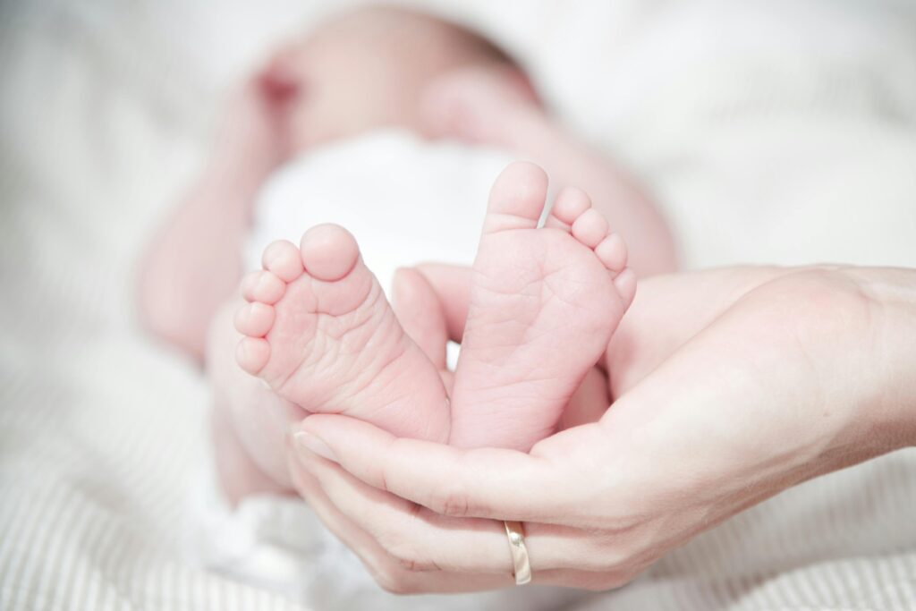 Cute Muslim baby girl with soft smile, representing names starting with A