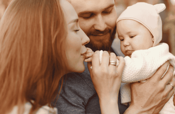 Family spend time in a summer garden